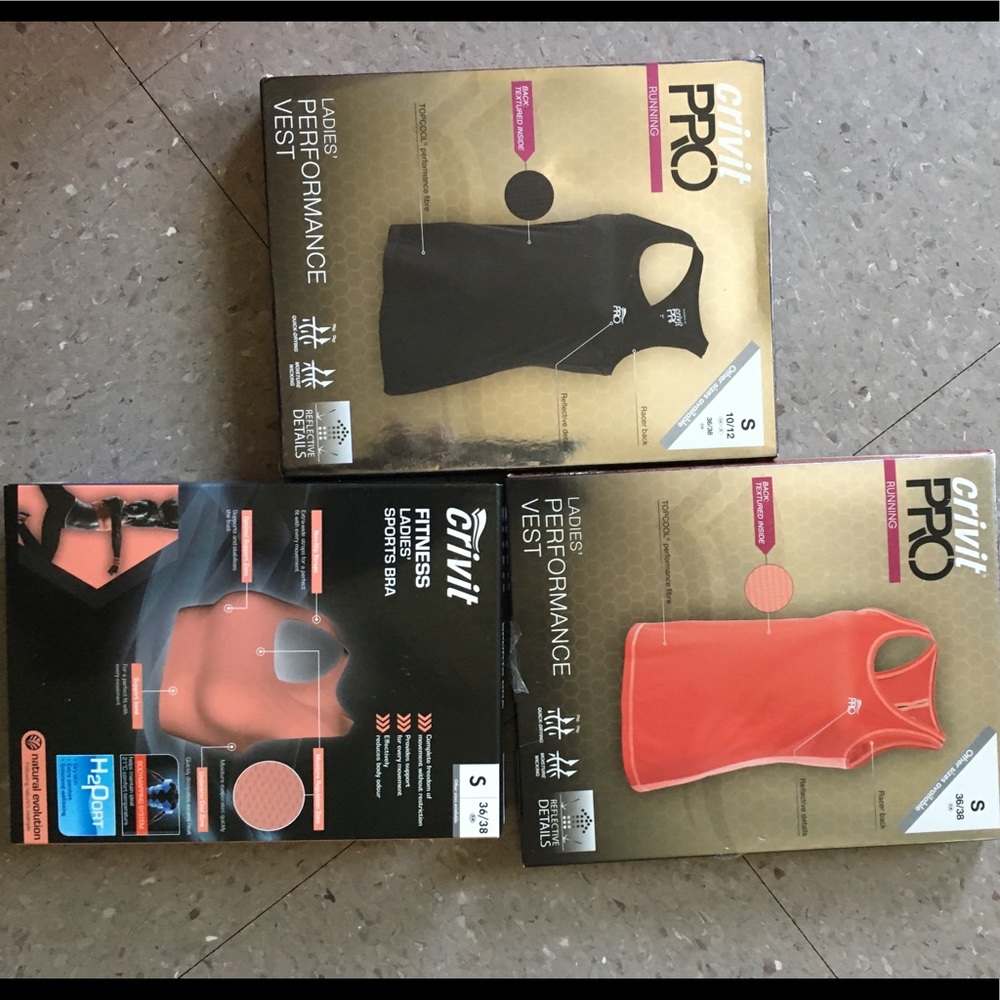 Sports bra& performance vest new in box never open